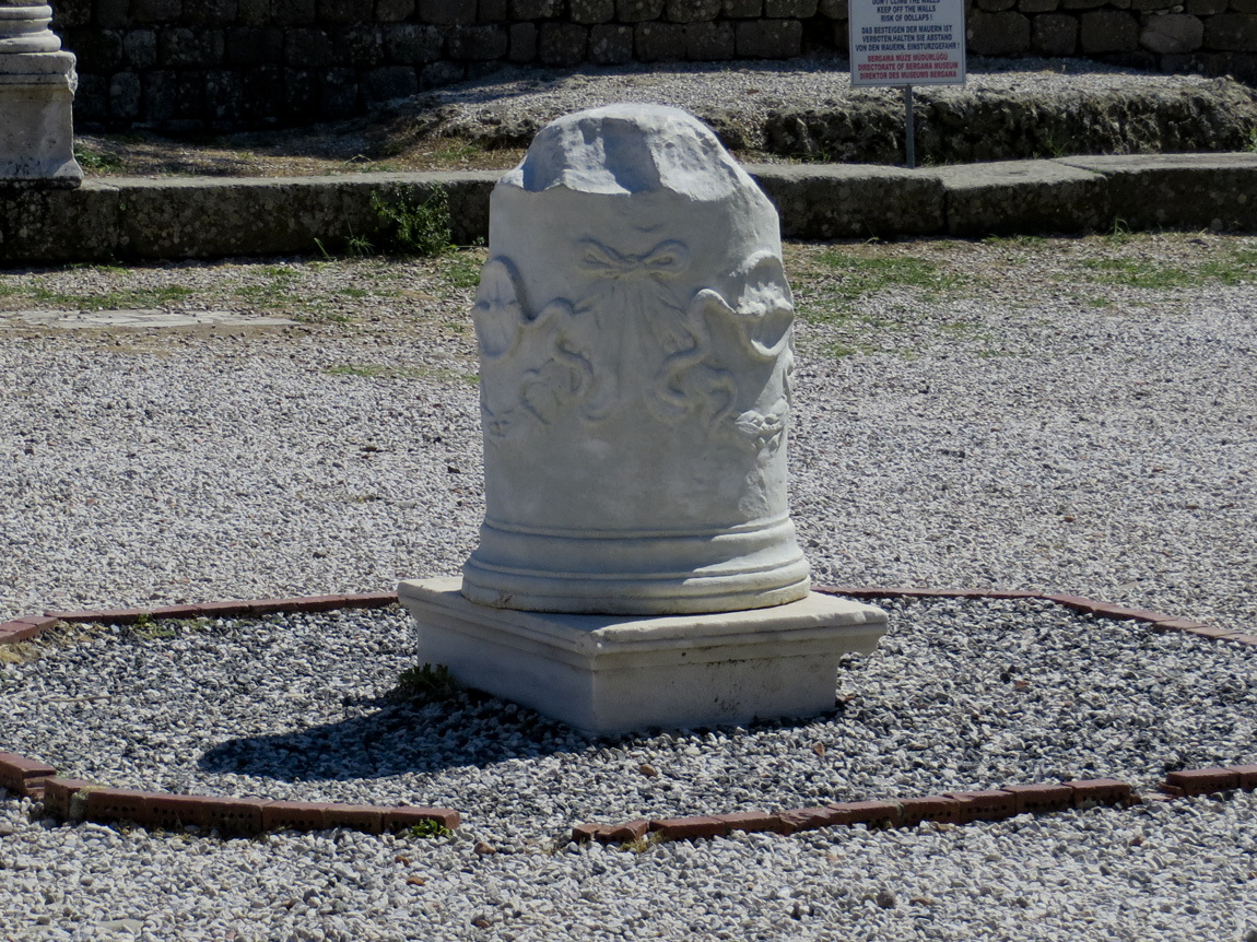 two snakes on marble column